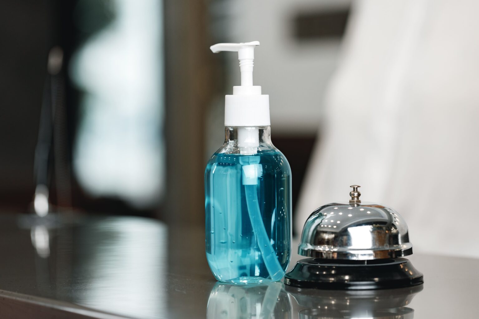 antibacterial-hand-sanitizer-gel-on-hotel-front-de-2025-02-25-17-14-18-utc(1)